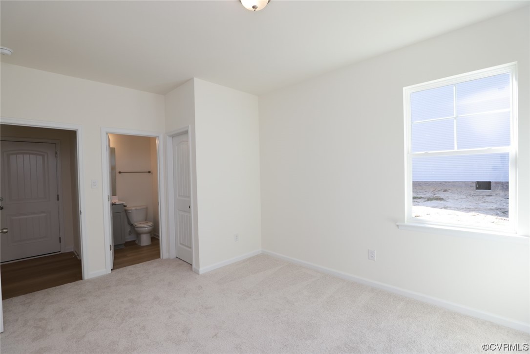 3830 Belspring Road Chester, VA 23831 - Photo 17 of 43 an empty room with a bathroom