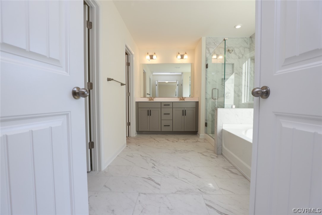 3830 Belspring Road Chester, VA 23831 - Photo 22 of 43 a bathroom with a tub sink and mirror