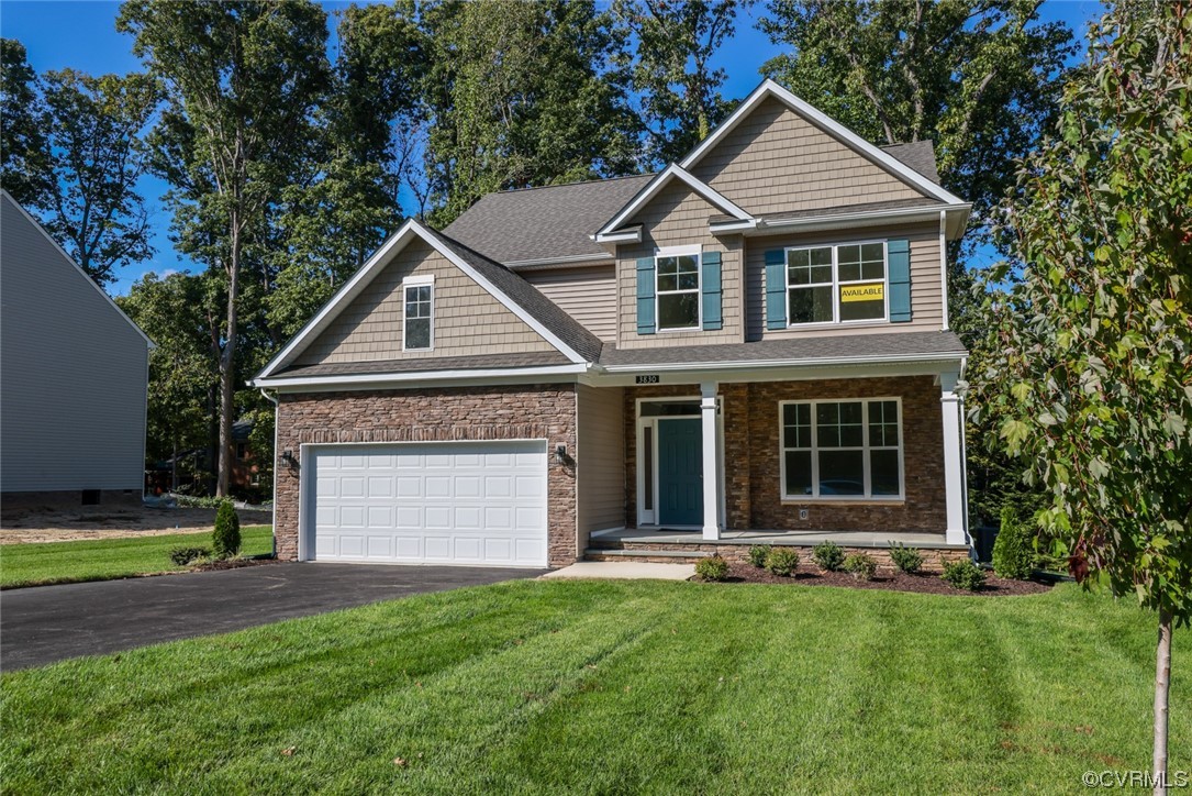 3830 Belspring Road Chester, VA 23831 - Photo 31 of 43 a front view of a house with a yard and garage