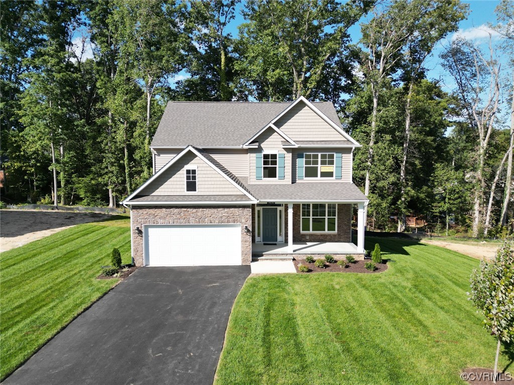 3830 Belspring Road Chester, VA 23831 - Photo 32 of 43 a front view of a house with a yard and trees