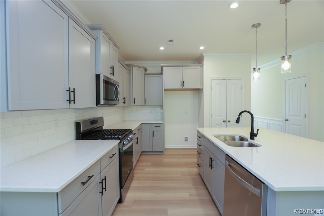 3830 Belspring Road Chester, VA 23831 - Photo 10 of 43 a kitchen with stainless steel appliances granite countertop a sink a stove and a refrigerator