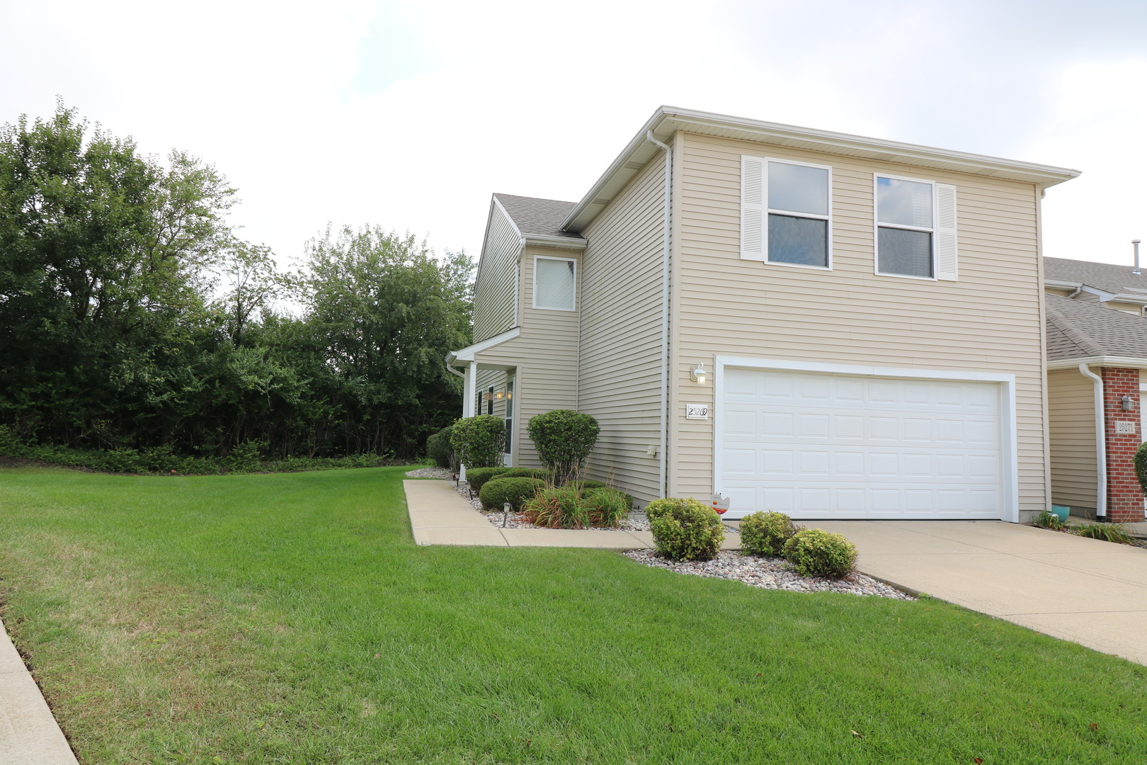 25269 Faraday Road Manhattan, IL 60442 - Photo 1 of 17 a front view of house with yard and green space