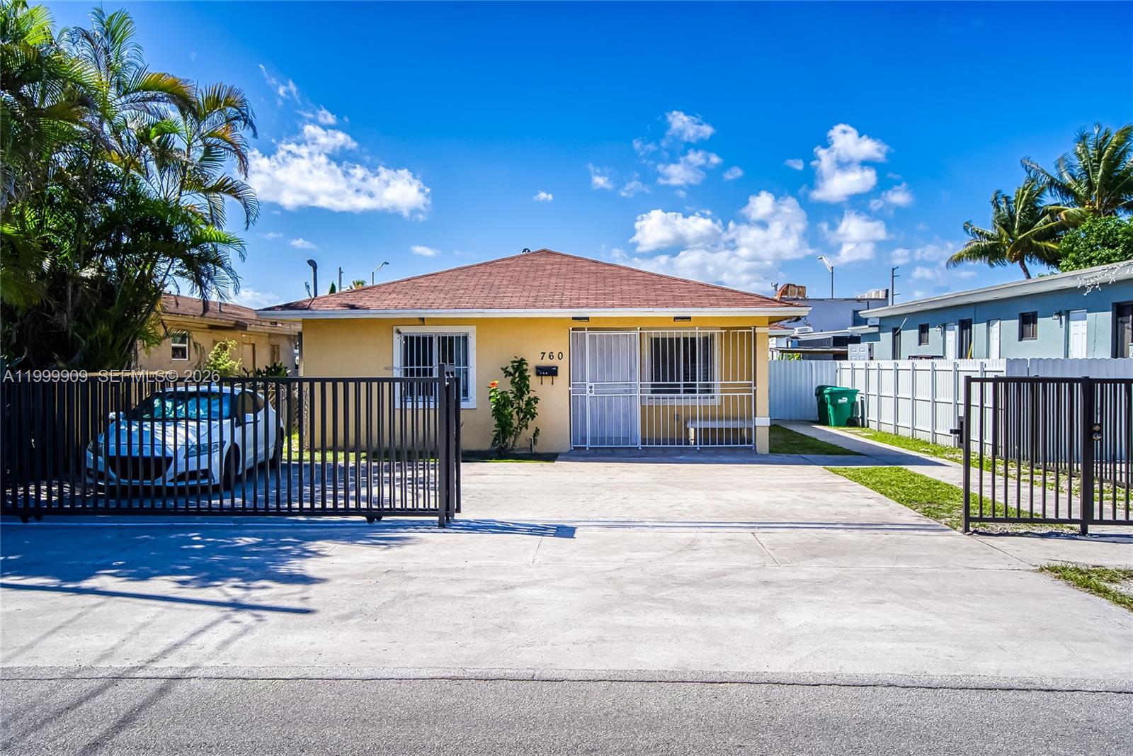 760 Northwest 80th Street, Unit 760 Miami, FL 33150 - Photo 1 of 32 a view of a house with a balcony