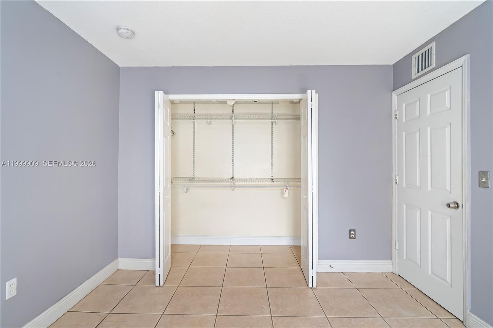 760 Northwest 80th Street, Unit 760 Miami, FL 33150 - Photo 13 of 32 a view of an empty room
