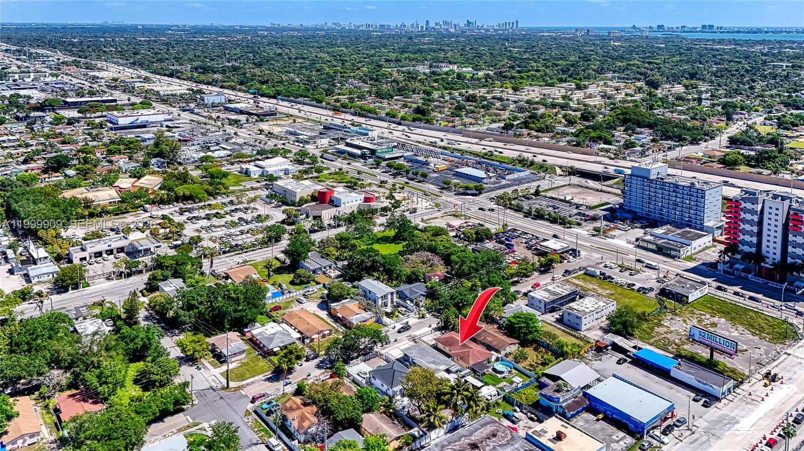 760 Northwest 80th Street, Unit 760 Miami, FL 33150 - Photo 29 of 32 an aerial view of residential houses with outdoor space