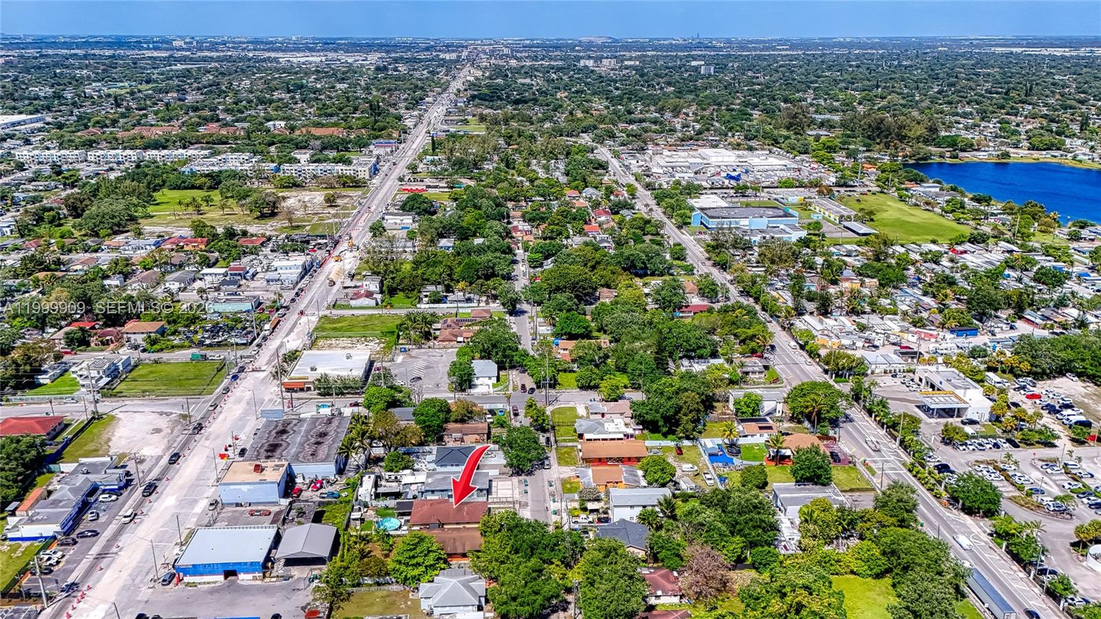 760 Northwest 80th Street, Unit 760 Miami, FL 33150 - Photo 31 of 32 an aerial view of residential houses with outdoor space and trees
