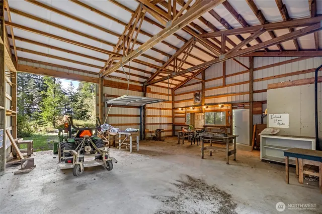 a view of a garage with a table and chairs