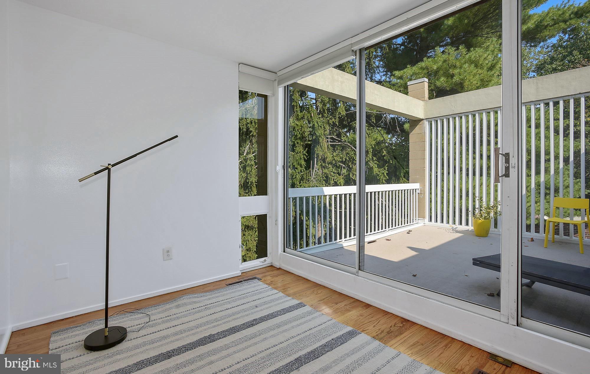 11544 Hickory Cluster Reston, VA 20190 - Photo 24 of 34 Upper-Level Bedroom #2 leads to Balcony