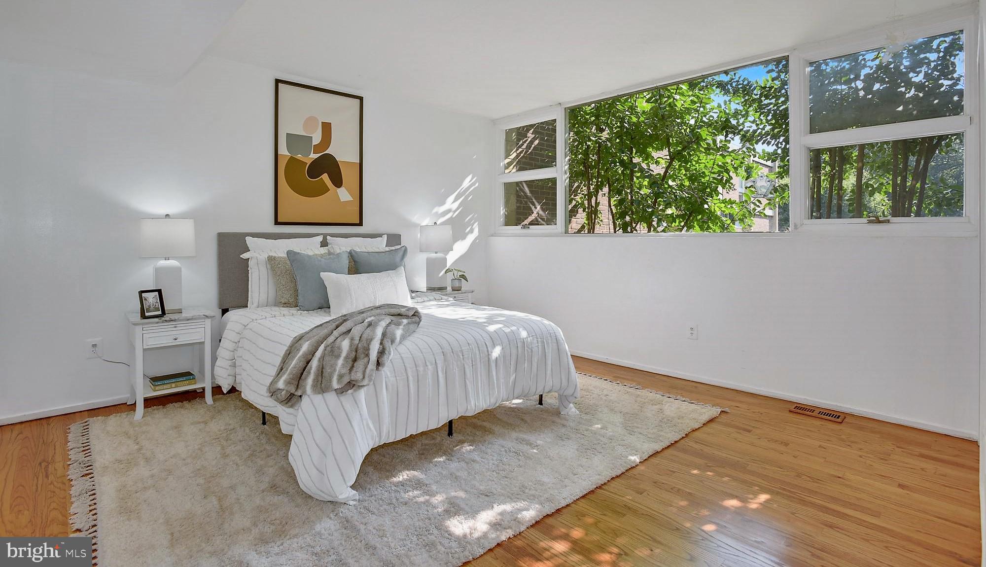 11544 Hickory Cluster Reston, VA 20190 - Photo 8 of 34 Main Level Primary Bedroom