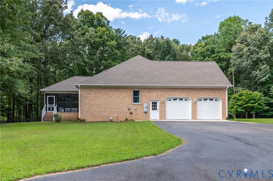 6724 Claiborne Road Sutherland, VA 23885 - Photo 28 of 33 View of home's exterior with driveway, an attached