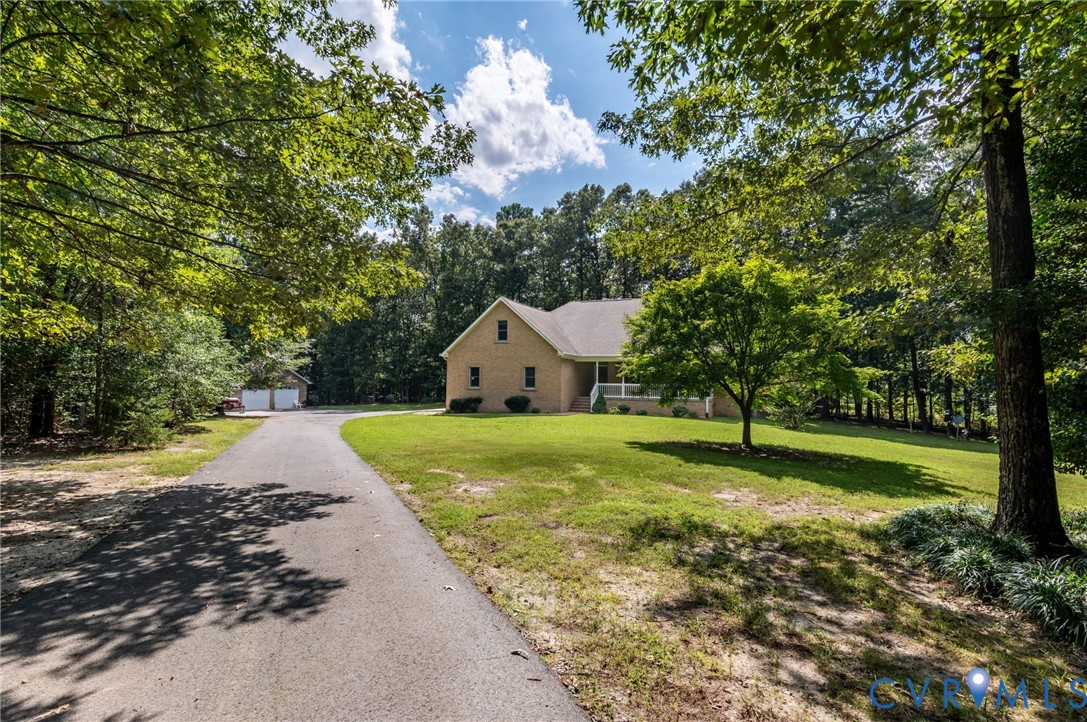 6724 Claiborne Road Sutherland, VA 23885 - Photo 3 of 33 View of front of property featuring an outdoor str
