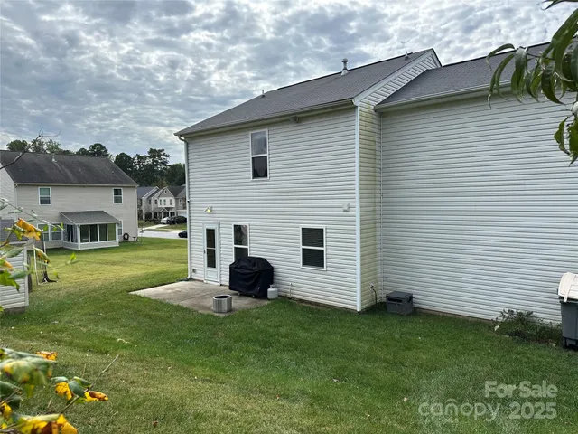 a view of outdoor space yard and front view of a house