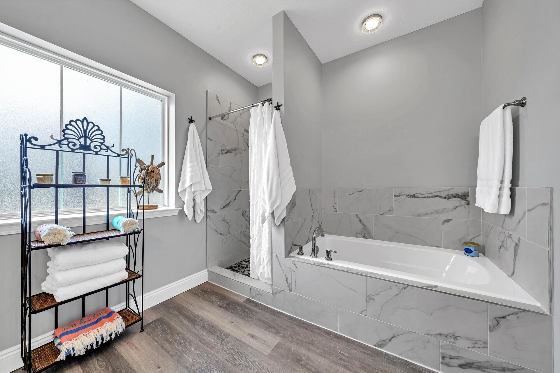 285 Indian Woman Road Santa Rosa Beach, FL 32459 - Photo 20 of 39 a bathroom with a bathtub and a shower