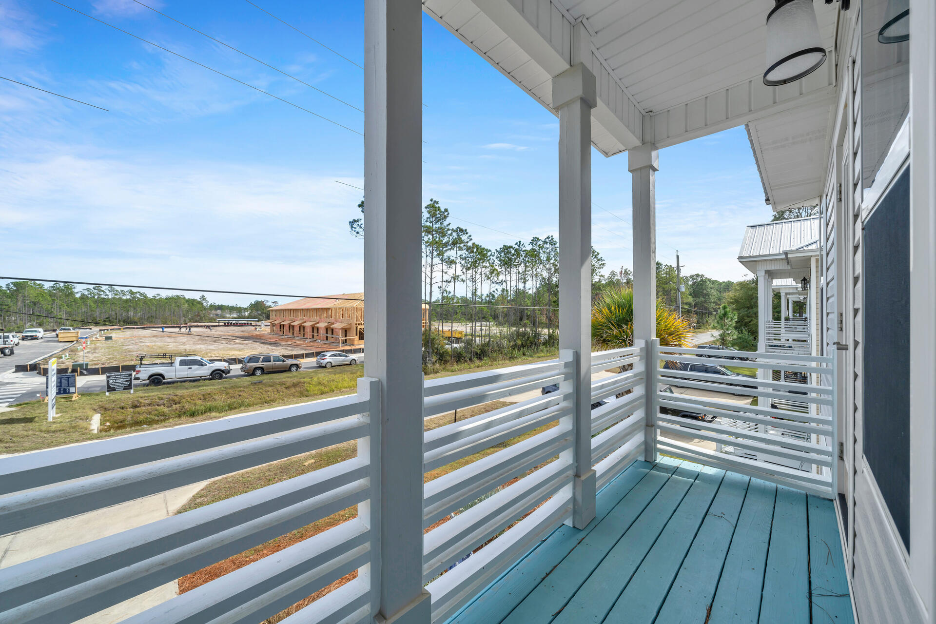 285 Indian Woman Road Santa Rosa Beach, FL 32459 - Photo 26 of 39 a view of balcony with wooden floor and fence