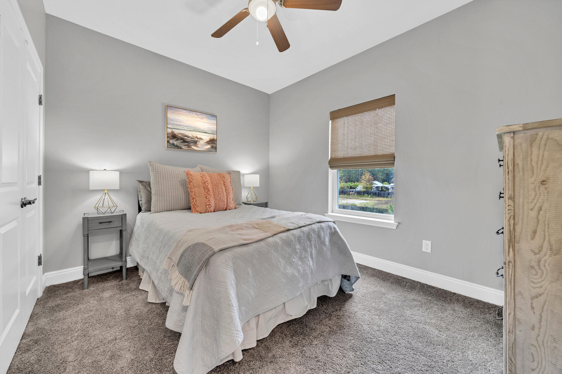 285 Indian Woman Road Santa Rosa Beach, FL 32459 - Photo 27 of 39 a bedroom with a bed and a window