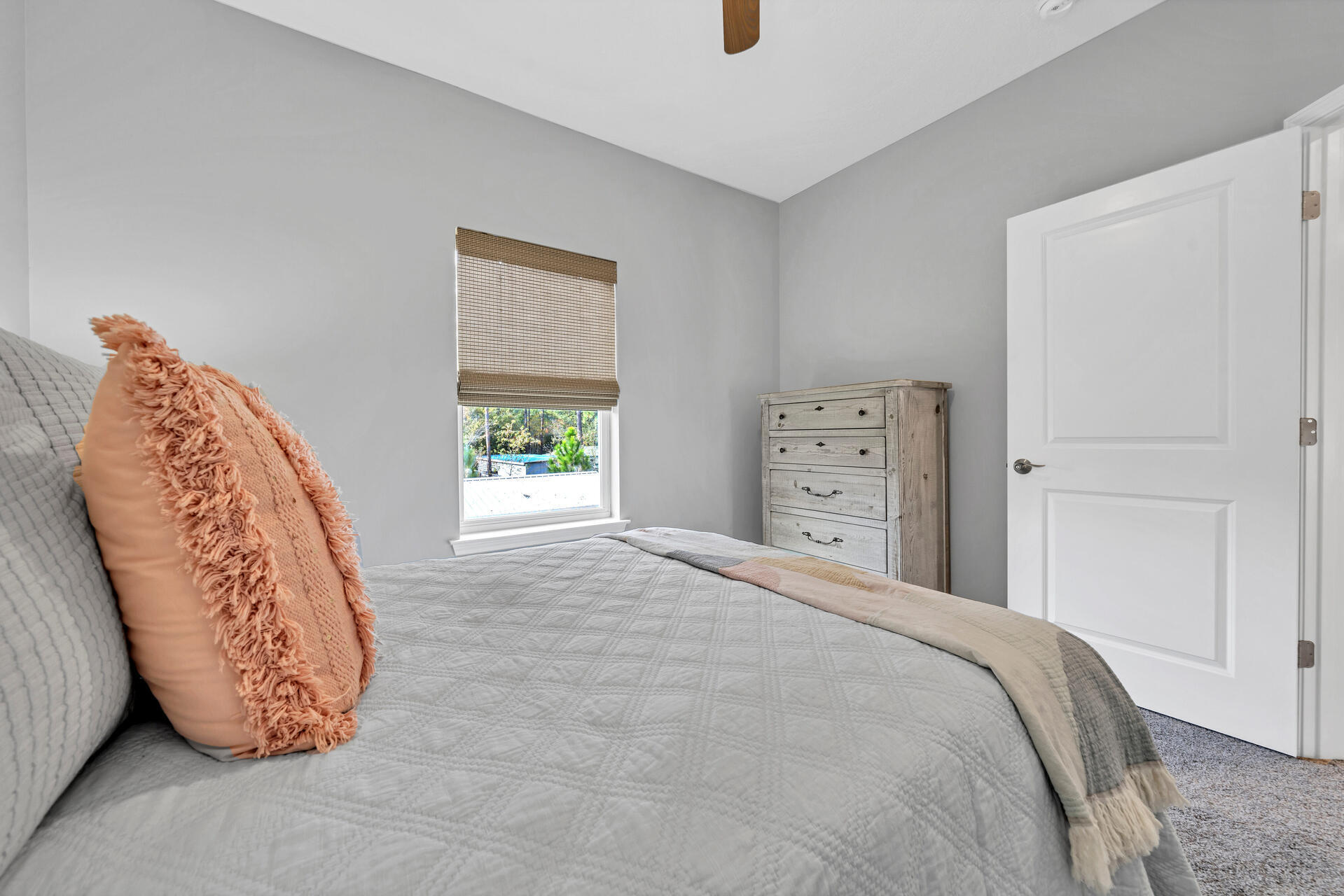 285 Indian Woman Road Santa Rosa Beach, FL 32459 - Photo 28 of 39 a large bed sitting in a bedroom next to a window