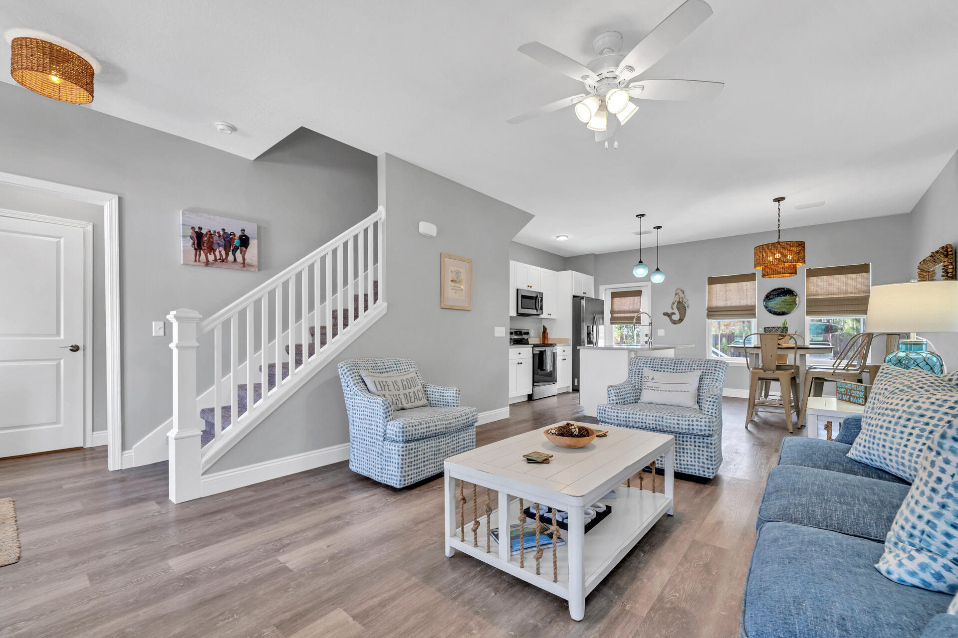 285 Indian Woman Road Santa Rosa Beach, FL 32459 - Photo 6 of 39 a living room with furniture and a chandelier