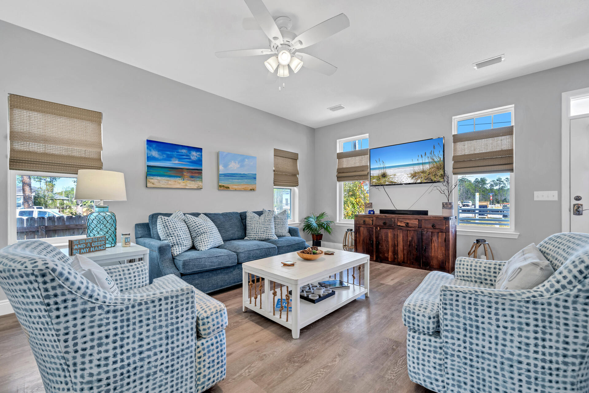 285 Indian Woman Road Santa Rosa Beach, FL 32459 - Photo 8 of 39 a living room with furniture a fireplace and a window