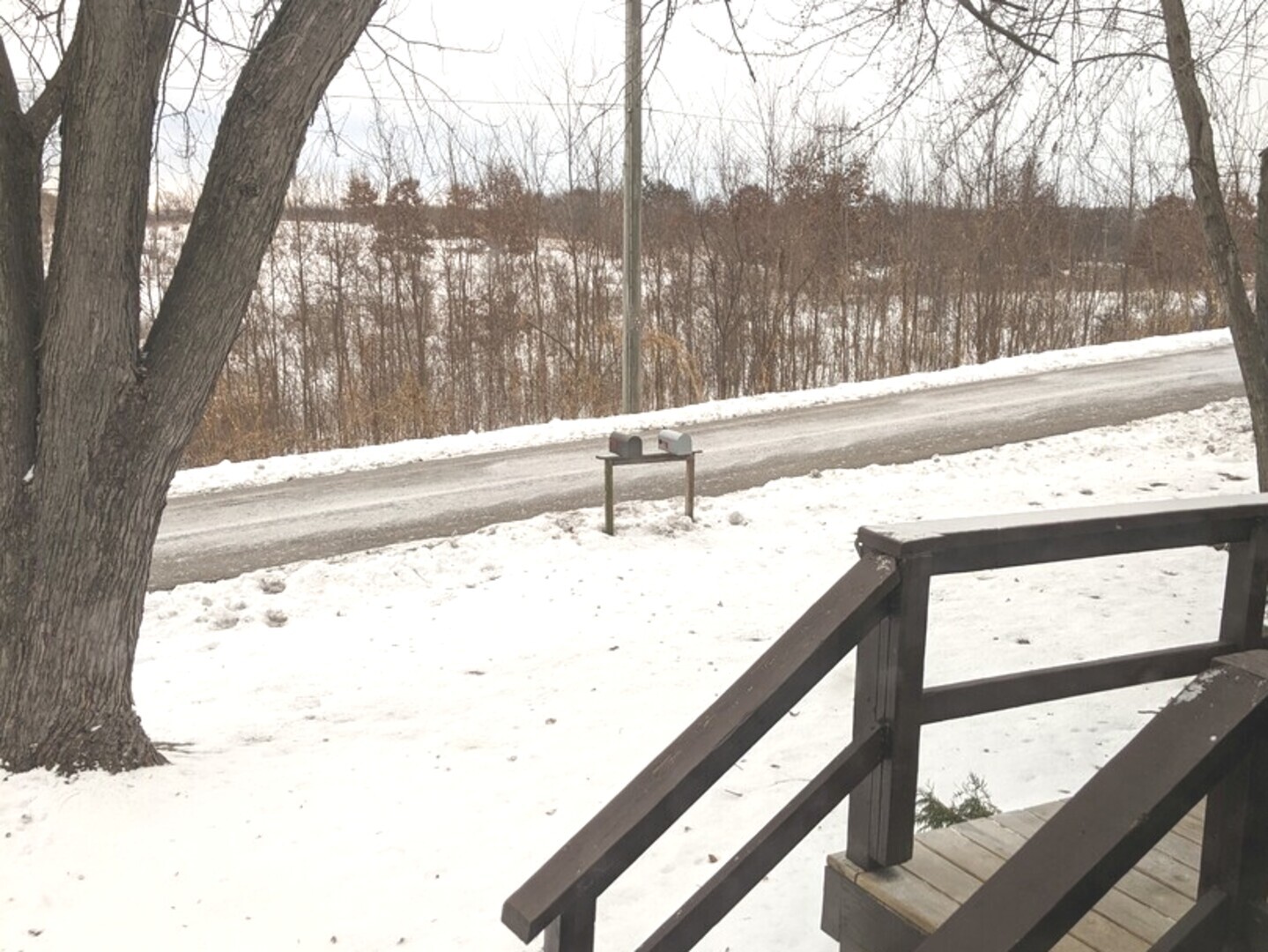 423 Grand Boulevard, Unit 423 Wauconda, IL 60084 - Photo 14 of 14 a view of a lake from a window
