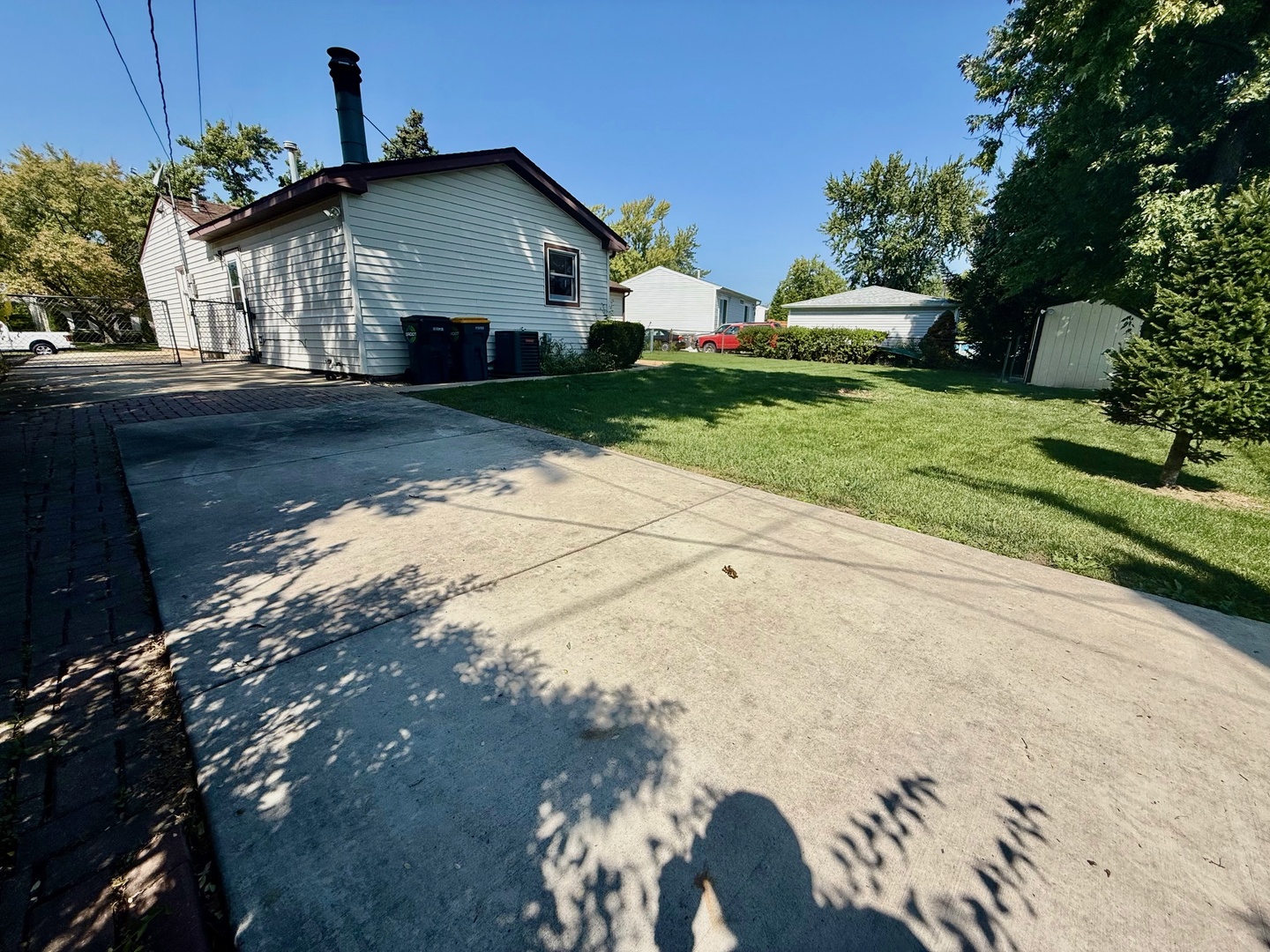 707 Sunset Circle Streamwood, IL 60107 - Photo 15 of 17 a front view of house with yard and green space