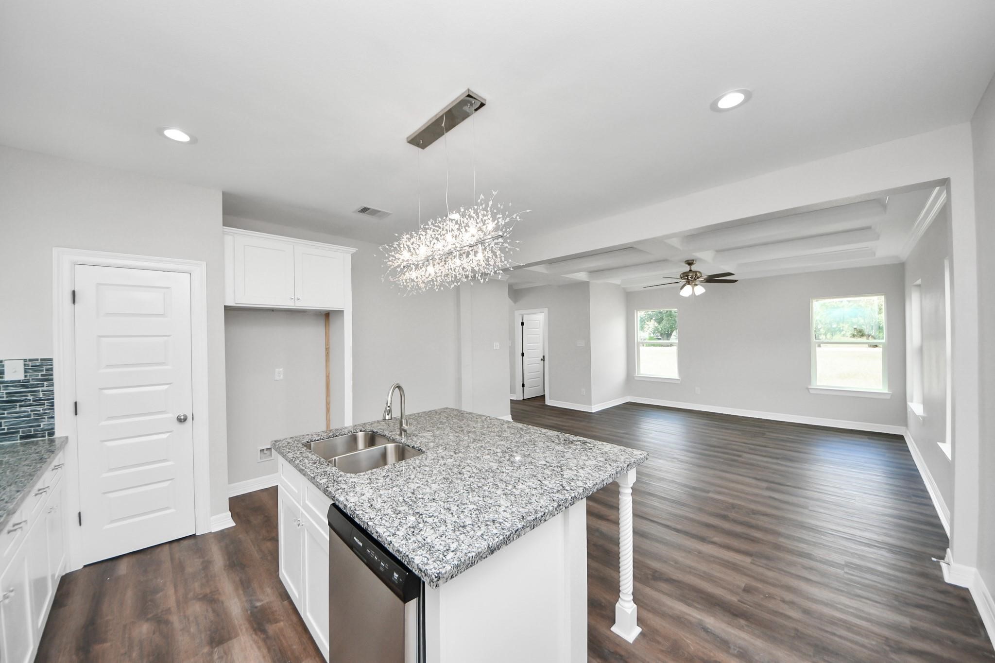 418 North 4th Street Beasley, TX 77417 - Photo 13 of 29 wooden floor in an empty room with a window