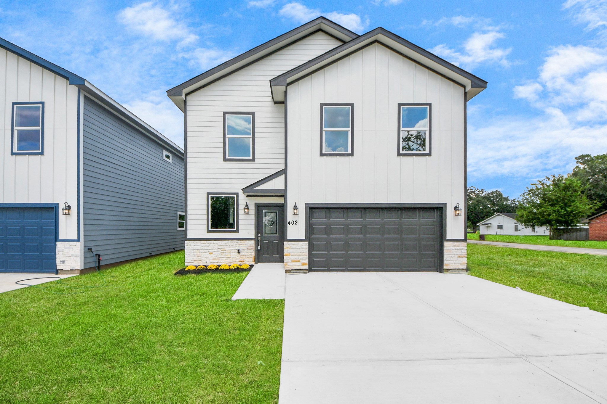 418 North 4th Street Beasley, TX 77417 - Photo 2 of 29 a front view of house with yard and green space