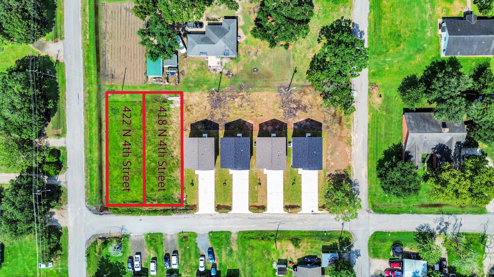 418 North 4th Street Beasley, TX 77417 - Photo 27 of 29 front view of a house with a garden