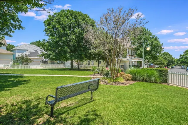 a view of a house with backyard