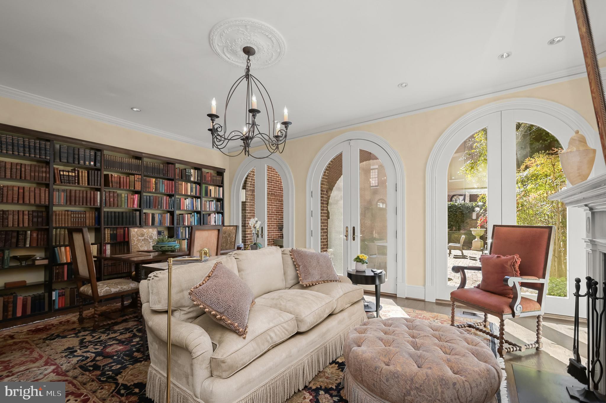 3224 Volta Place Northwest Washington, DC 20007 - Photo 11 of 35 a living room with furniture a chandelier and a large window