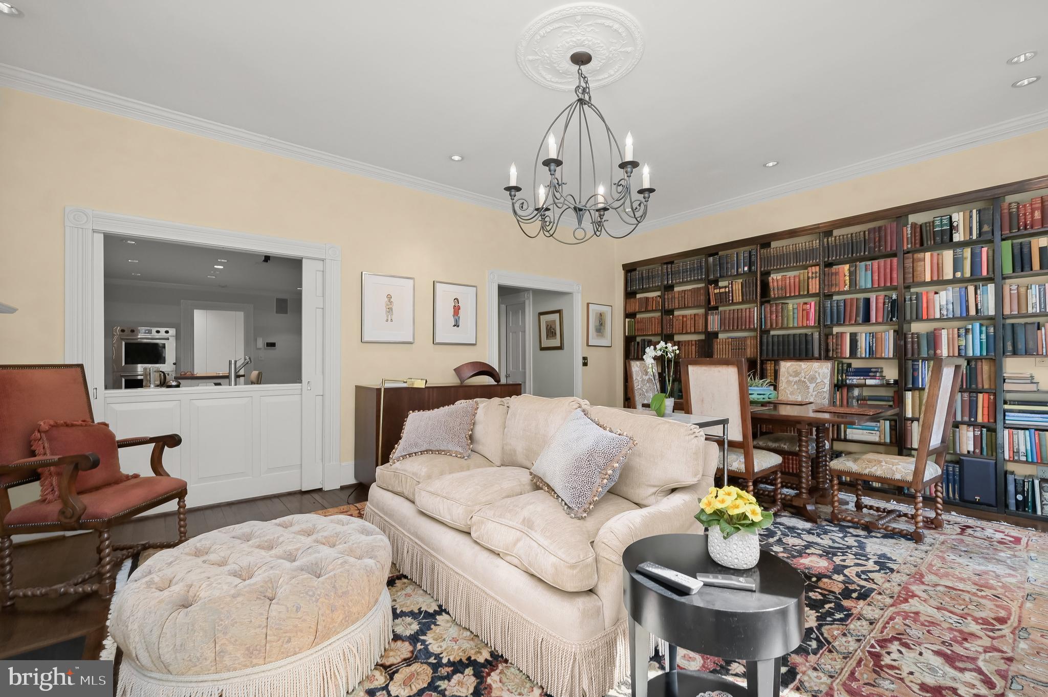 3224 Volta Place Northwest Washington, DC 20007 - Photo 13 of 35 a living room with furniture and a chandelier