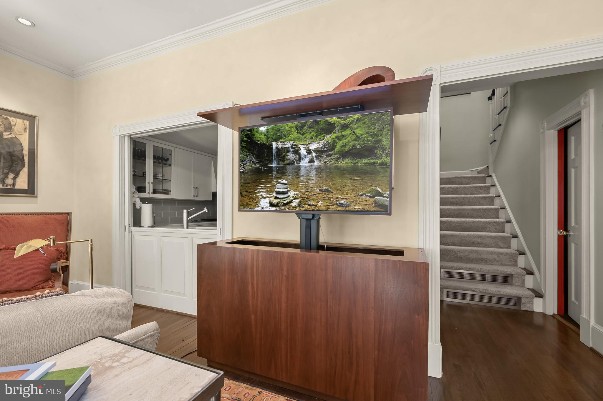 3224 Volta Place Northwest Washington, DC 20007 - Photo 14 of 35 a view of a living room and a wooden floor