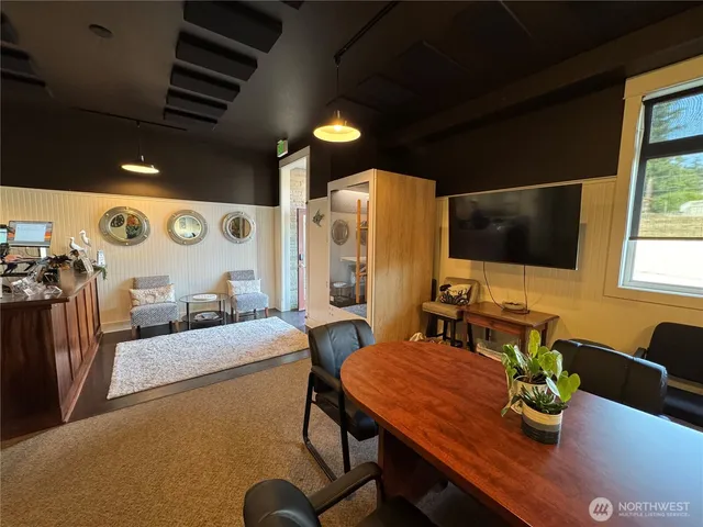 a view of a dining room with furniture