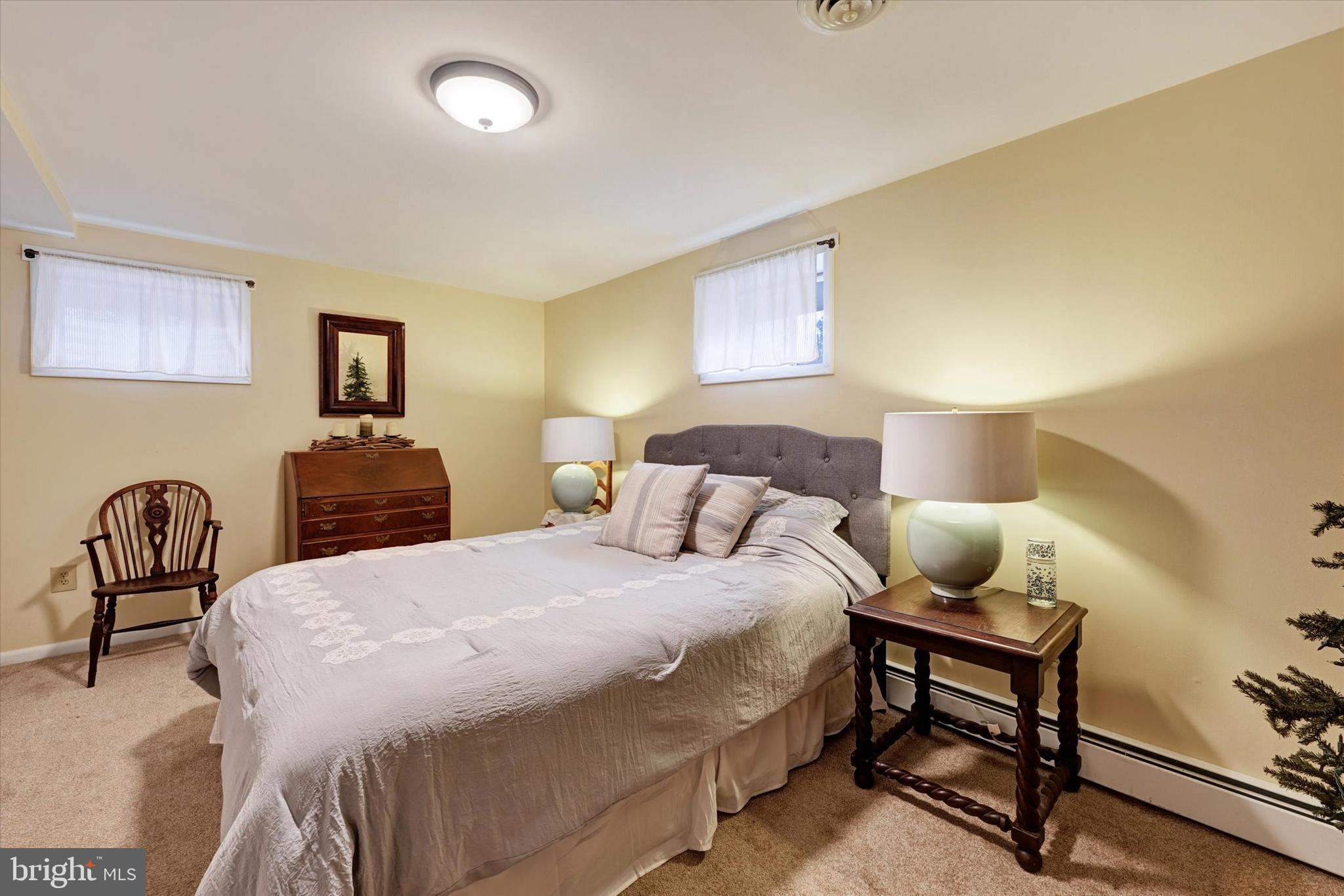 13324 Manor Road Baldwin, MD 21013 - Photo 24 of 34 a bedroom with a bed and chair