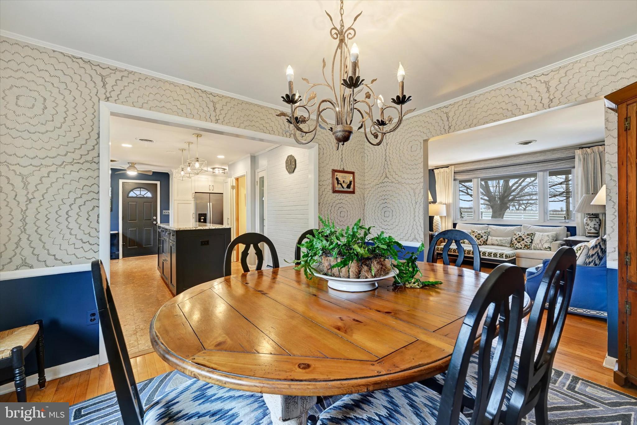 13324 Manor Road Baldwin, MD 21013 - Photo 34 of 34 a dining room with furniture a livingroom and chandelier