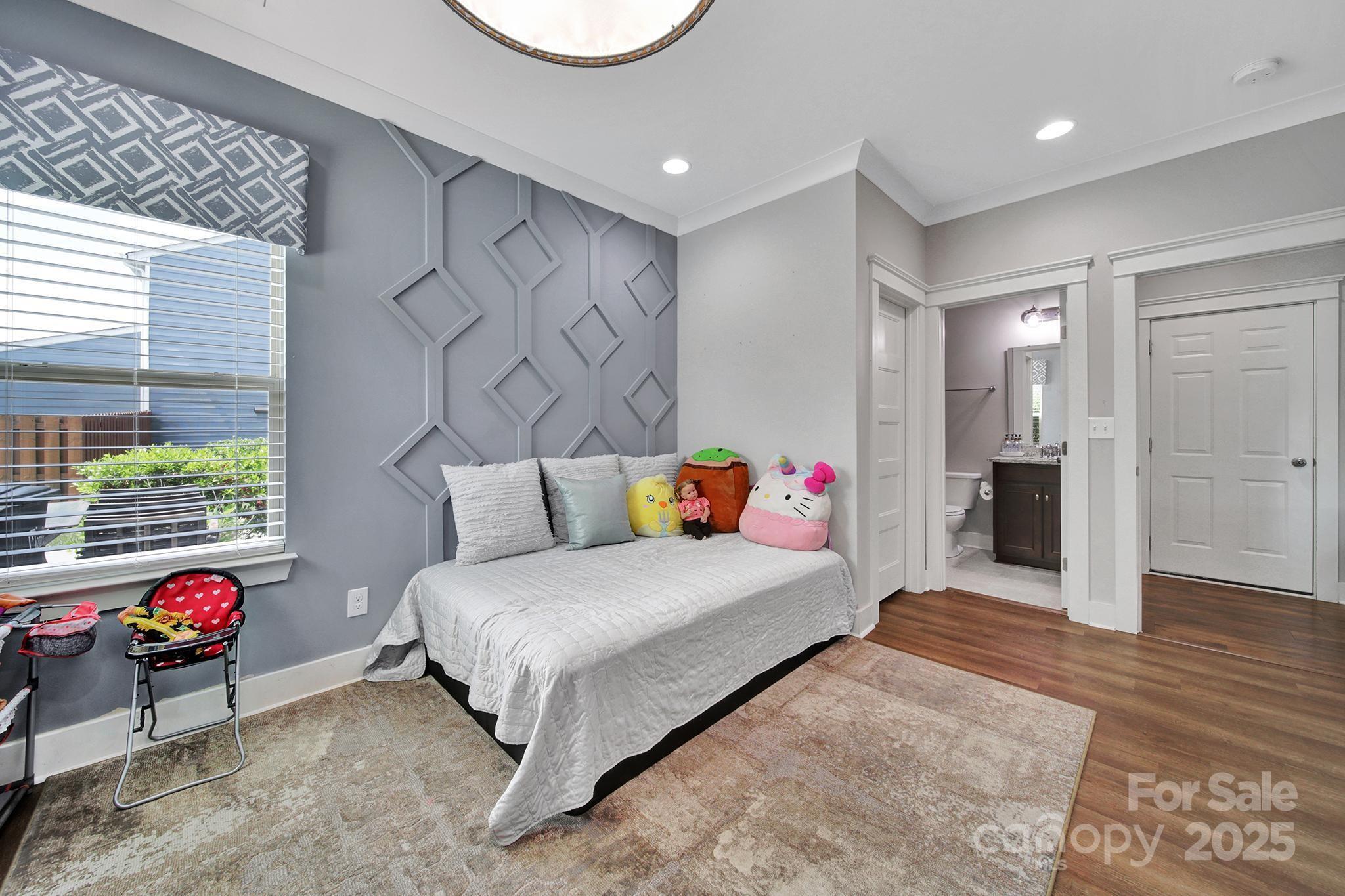 2015 Knocktree Drive Indian Trail, NC 28079 - Photo 17 of 45 a bedroom with a bed and a window