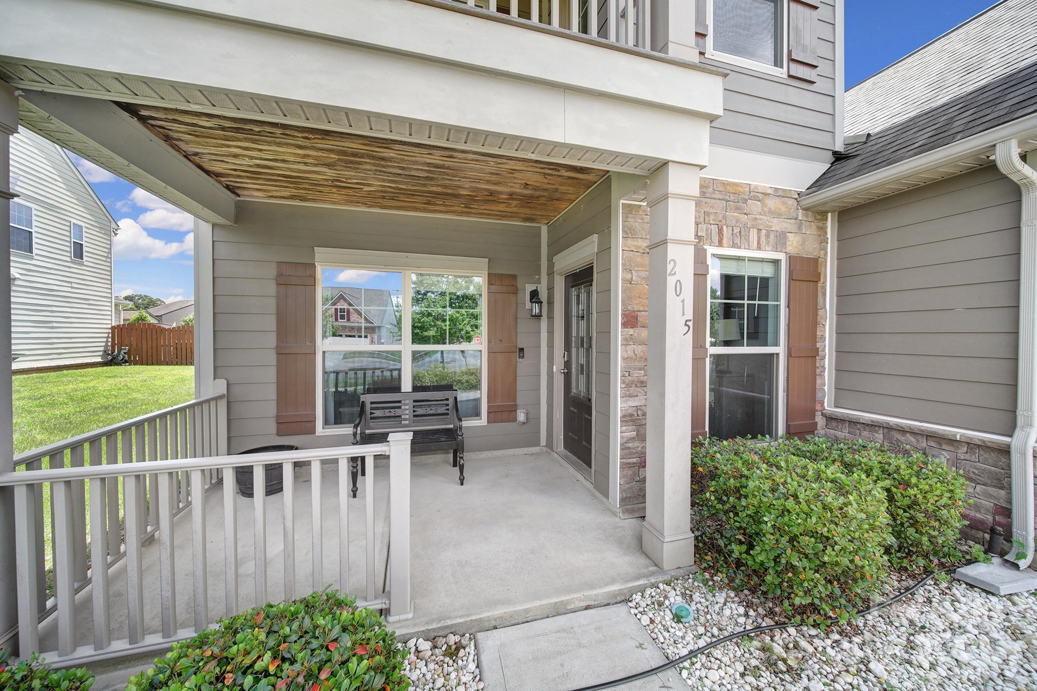 2015 Knocktree Drive Indian Trail, NC 28079 - Photo 2 of 45 a view of a chair and table in the patio