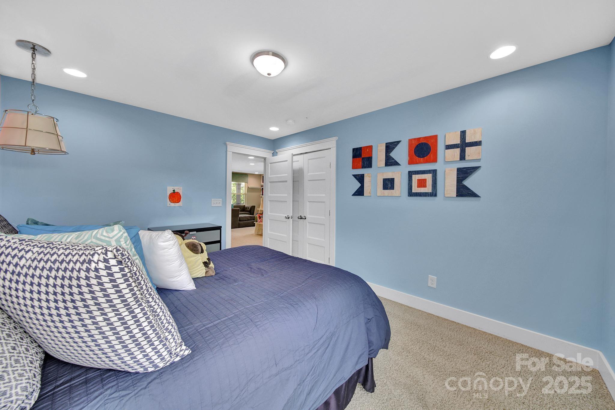 2015 Knocktree Drive Indian Trail, NC 28079 - Photo 25 of 45 a bedroom with a bed and a painting on the wall