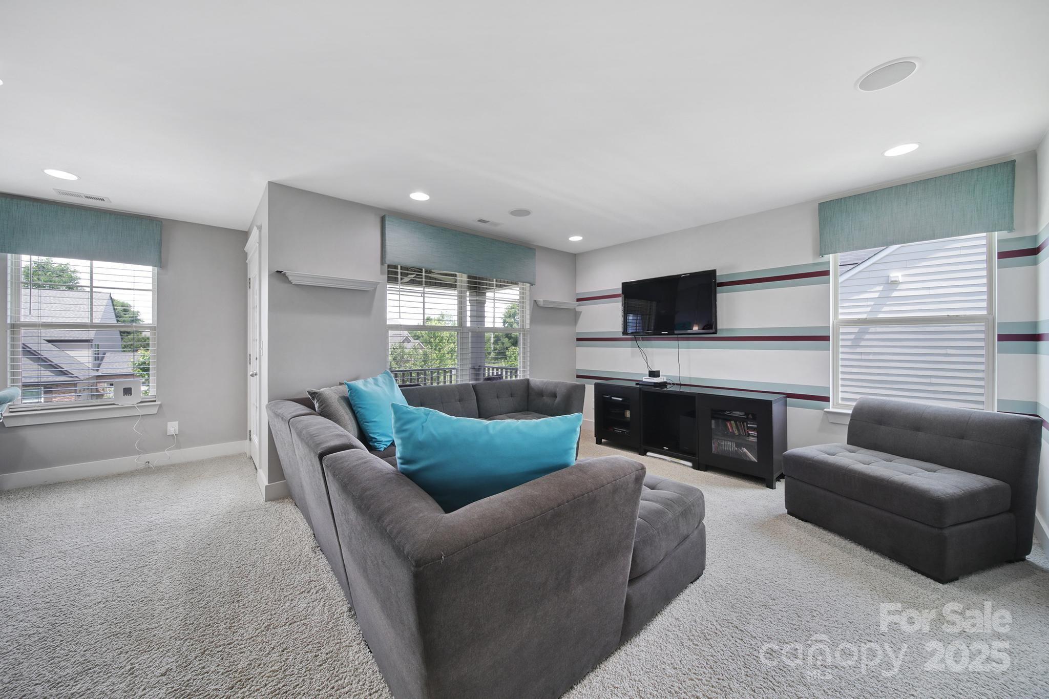 2015 Knocktree Drive Indian Trail, NC 28079 - Photo 29 of 45 a living room with furniture and a fireplace