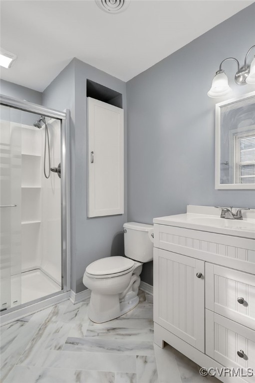 12047 Sunset Drive Ashland, VA 23005 - Photo 12 of 26 a bathroom with a sink toilet and shower
