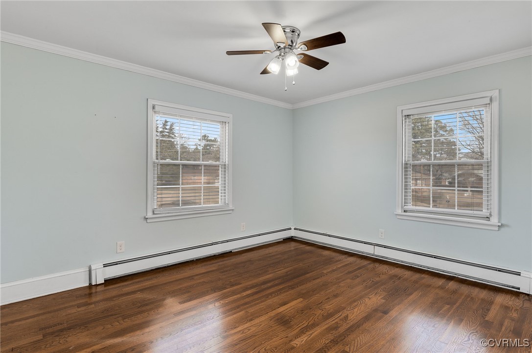 12047 Sunset Drive Ashland, VA 23005 - Photo 13 of 26 a view of an empty room with wooden floor and a window