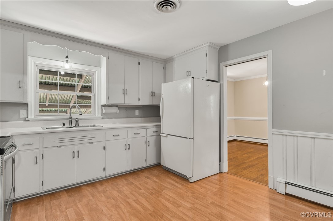 12047 Sunset Drive Ashland, VA 23005 - Photo 8 of 26 a kitchen with granite countertop cabinets appliances and a window