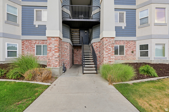 116 East Resaca Drive, Unit F6 Sandy, UT 84070 - Photo 25 of 32 Multi-level building exterior featuring brick and siding accents