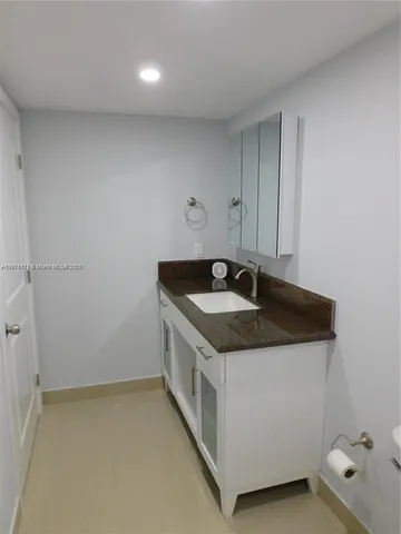a utility room with a sink