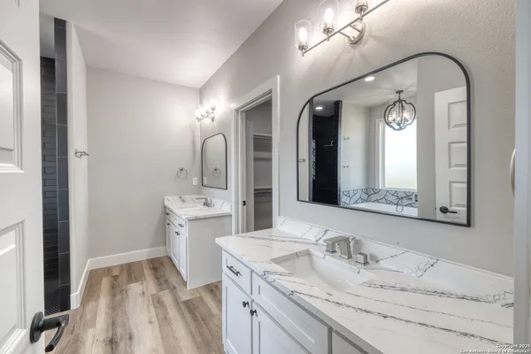 a bathroom with a bathtub and shower