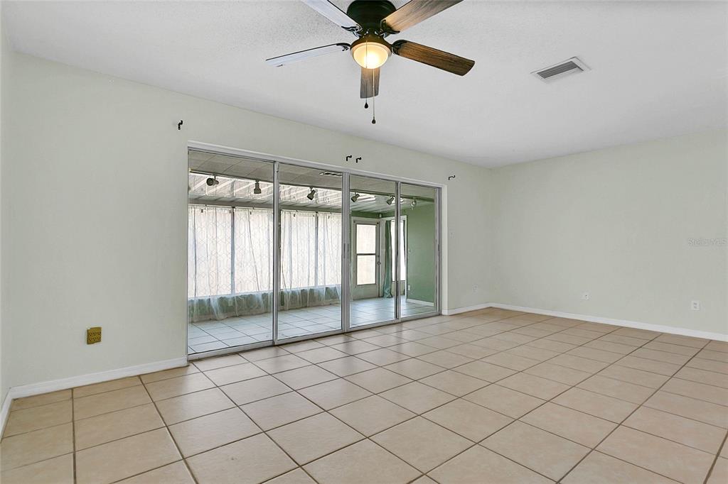 561 East Orange Street Altamonte Springs, FL 32701 - Photo 11 of 24 a view of an empty room with window