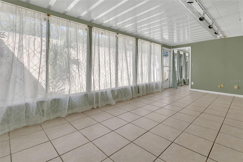 561 East Orange Street Altamonte Springs, FL 32701 - Photo 21 of 24 a view of an empty room with a window