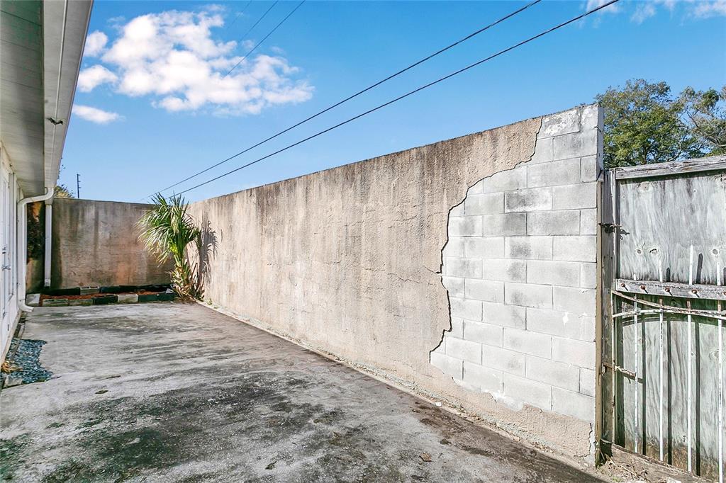 561 East Orange Street Altamonte Springs, FL 32701 - Photo 22 of 24 view of backyard with wooden fence