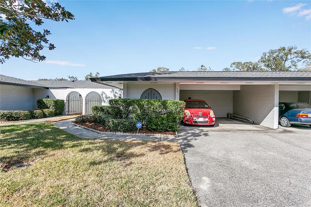 561 East Orange Street Altamonte Springs, FL 32701 - Photo 4 of 24 a view of a car park in front of a house
