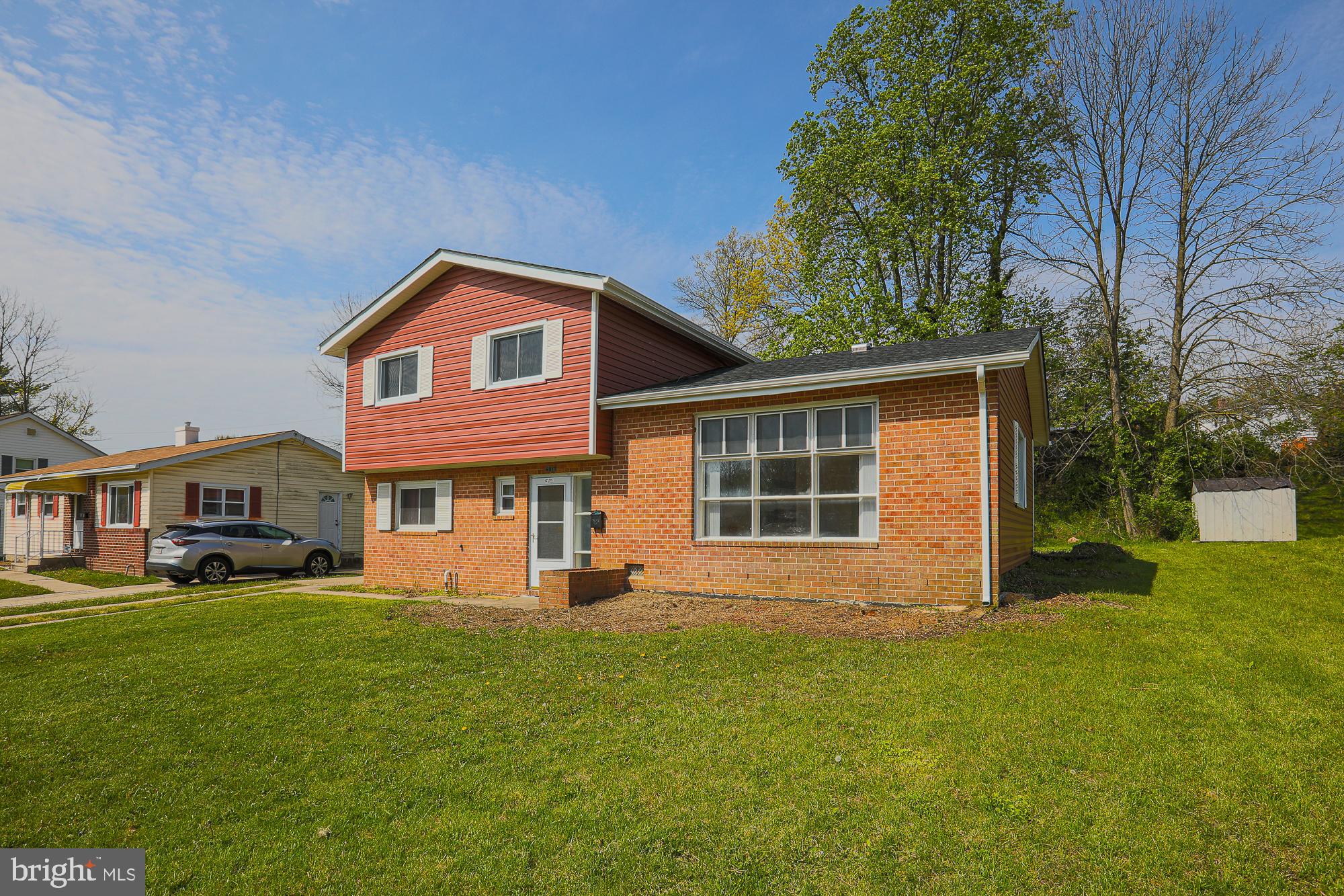 6817 Fox Meadow Road Baltimore, MD 21207 - Photo 4 of 27 NICE LEVEL YARD AWAITING YOUR GARDENING