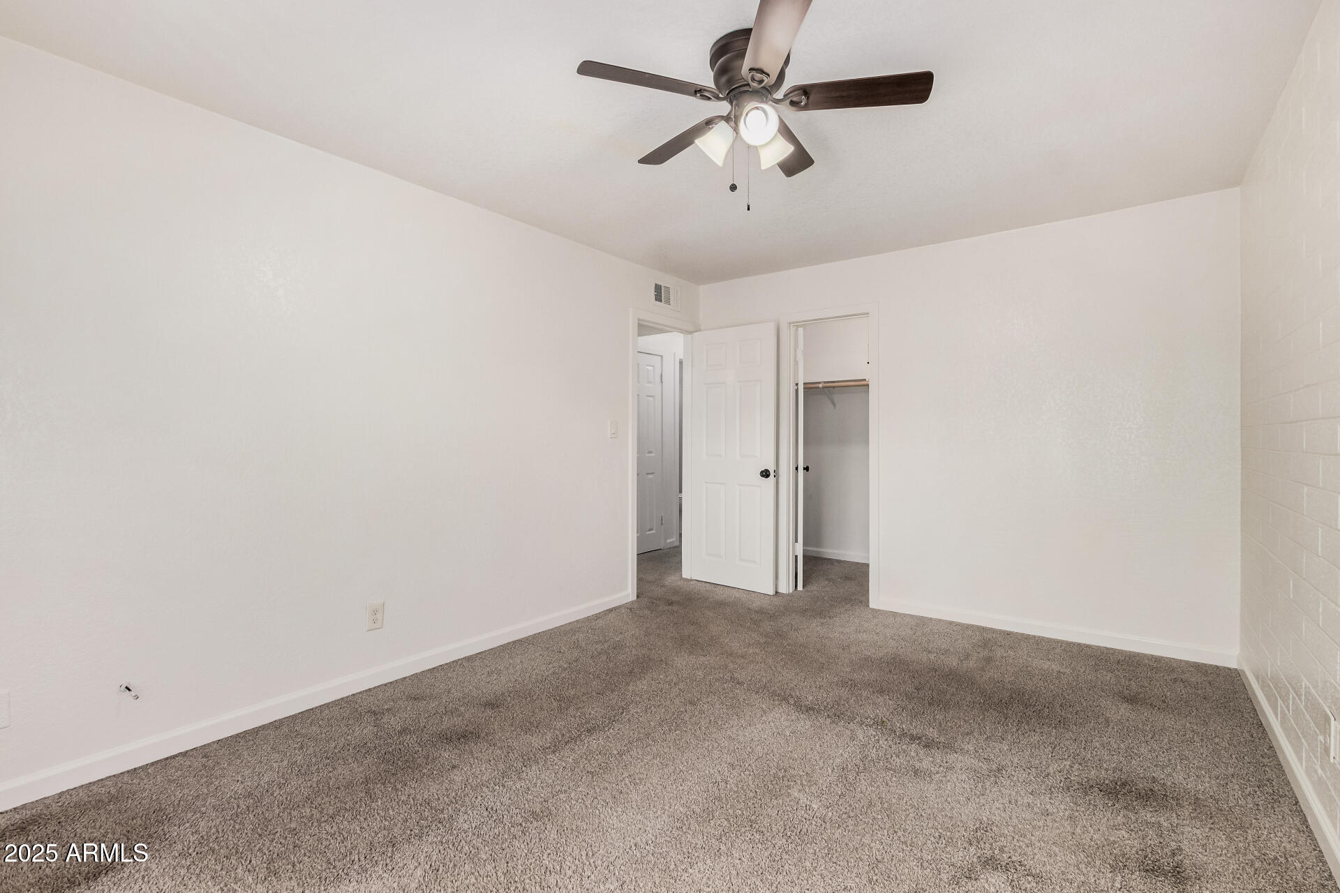 1804 West Tuckey Lane, Unit 1 Phoenix, AZ 85015 - Photo 17 of 25 a view of room with a ceiling fan